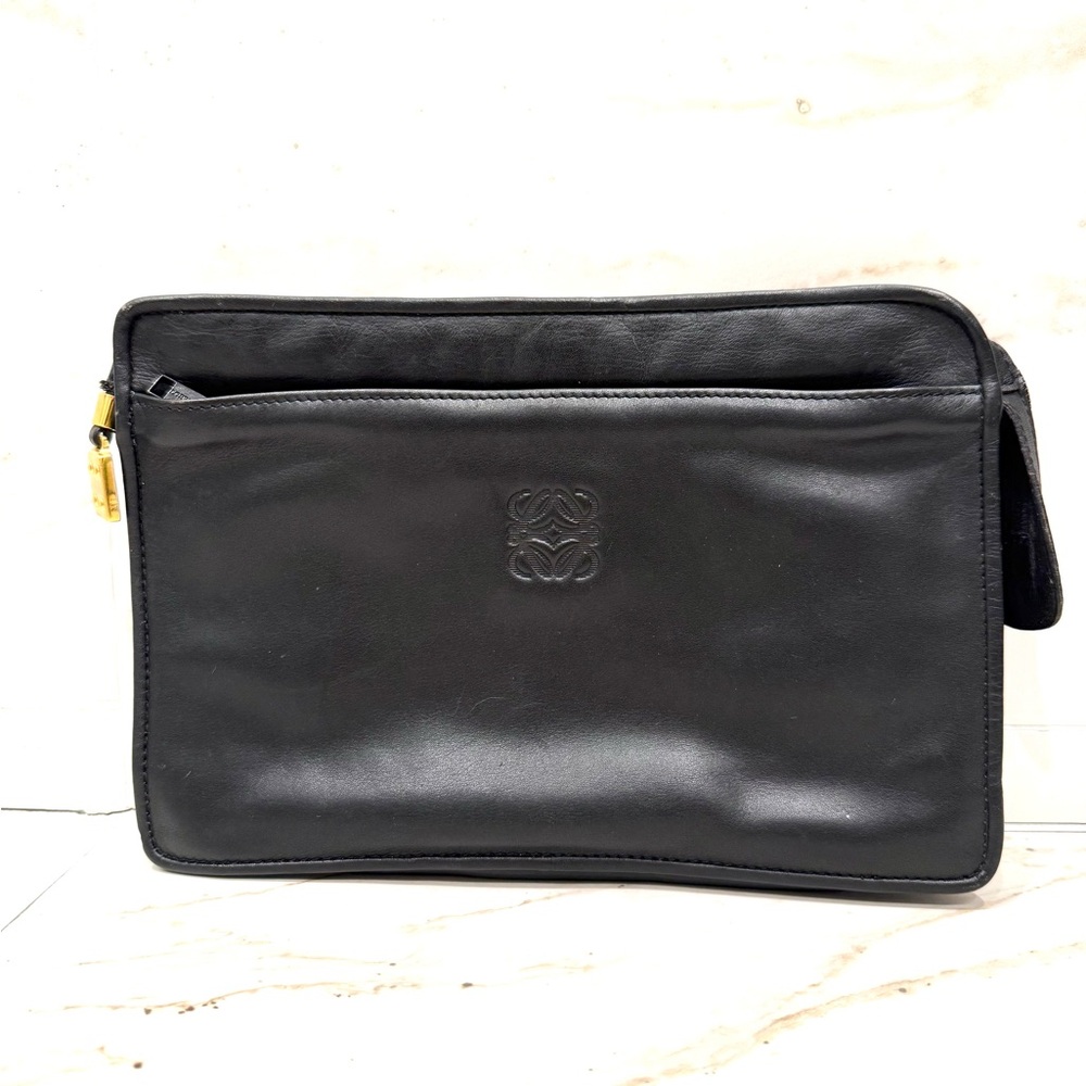 Elegant LOEWE Black Leather Bag Unisex Has pull out wrist strap, gold hardware